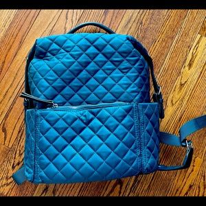 Quilted teal backpack with laptop pocket and adjustable straps